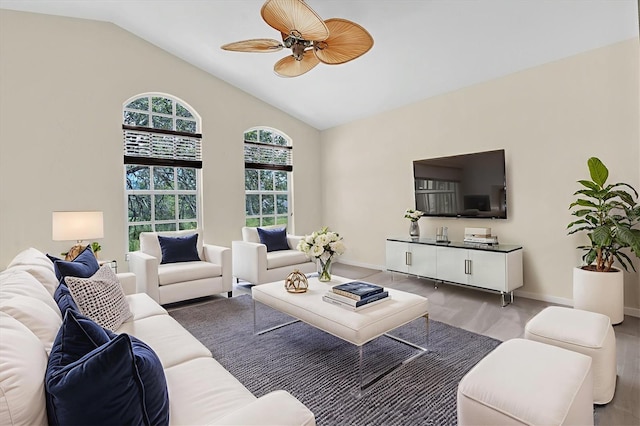 11418 Tee Time Cir, New Port Richey, FL 34654 - living area featuring a ceiling fan, wood finished floors, and high vaulted ceiling