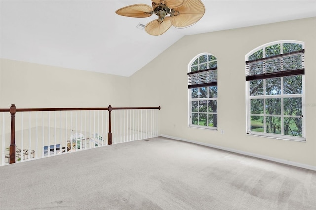 11418 Tee Time Cir, New Port Richey, FL 34654 - empty room featuring ceiling fan, carpet floors, and lofted ceiling