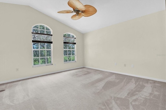 11418 Tee Time Cir, New Port Richey, FL 34654 - carpeted spare room with a ceiling fan and vaulted ceiling