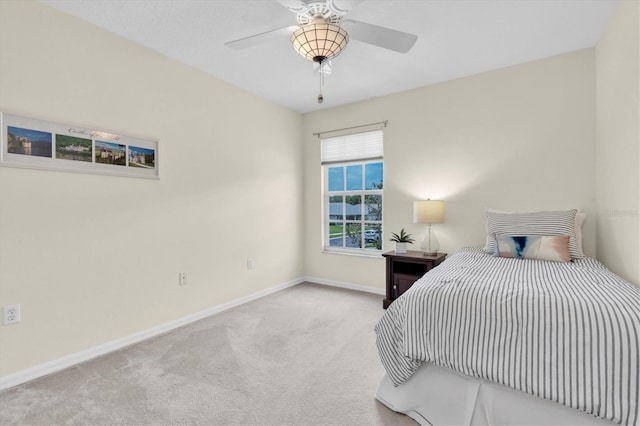 11418 Tee Time Cir, New Port Richey, FL 34654 - bedroom with carpet flooring and a ceiling fan