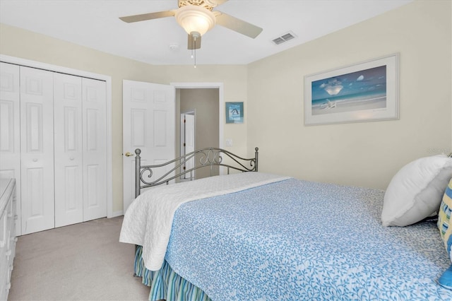11418 Tee Time Cir, New Port Richey, FL 34654 - bedroom with carpet floors, a closet, and ceiling fan