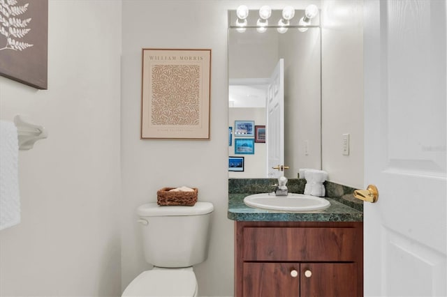 11418 Tee Time Cir, New Port Richey, FL 34654 - half bath featuring vanity and toilet