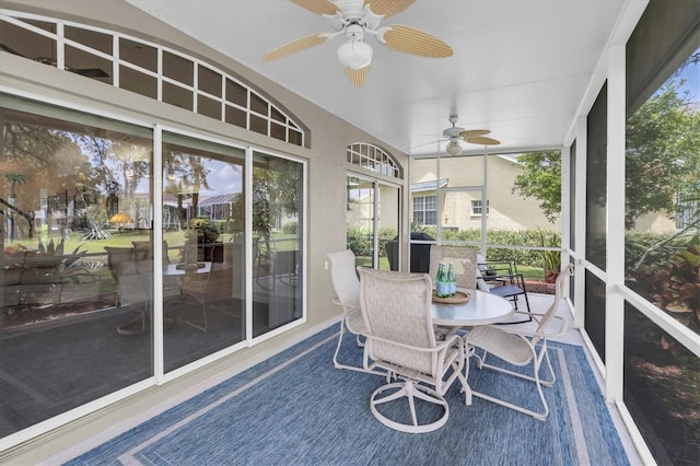 11418 Tee Time Cir, New Port Richey, FL 34654 - sunroom featuring ceiling fan and plenty of natural light