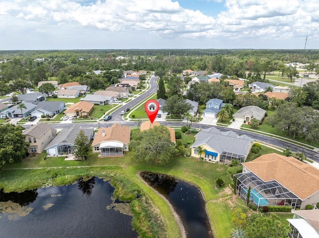 11418 Tee Time Cir, New Port Richey, FL 34654 - aerial view of property and surrounding area featuring nearby suburban area and a large body of water