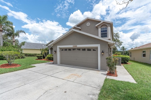 11418 Tee Time Cir, New Port Richey, FL 34654 - traditional-style house with concrete driveway, a front yard, stucco siding, and a garage