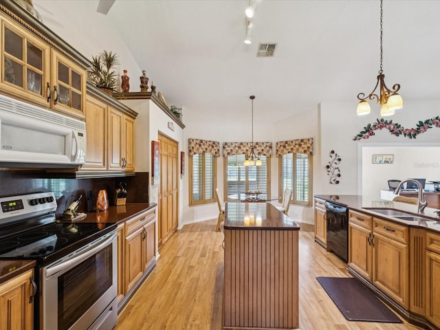 8401 Pavilion Dr, Hudson, FL 34667 - kitchen featuring stainless steel electric range, a chandelier, black dishwasher, white microwave, and dark countertops