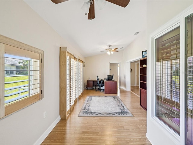 8401 Pavilion Dr, Hudson, FL 34667 - office space with ceiling fan, healthy amount of natural light, wood finished floors, and lofted ceiling