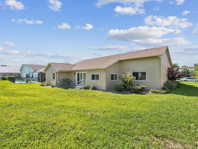 8401 Pavilion Dr, Hudson, FL 34667 - back of house with stucco siding and a pool
