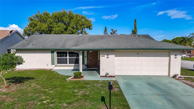 9425 Sterling Ln, Port Richey, FL 34668 - ranch-style home with brick siding, an attached garage, a front yard, and driveway