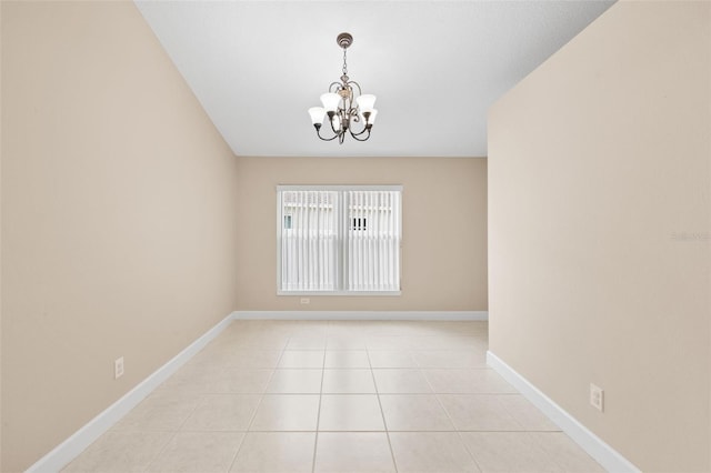 252 Arbor Woods Cir, Oldsmar, FL 34677 - unfurnished room with a chandelier and light tile patterned floors
