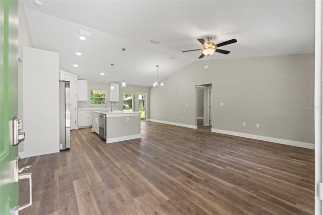 8782 N Sandree Dr, Citrus Springs, FL 34434 - unfurnished living room featuring a ceiling fan, lofted ceiling, dark wood-type flooring, and recessed lighting