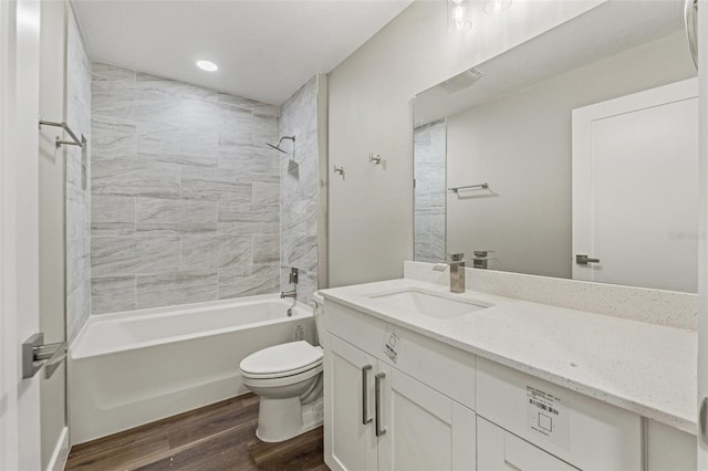 8782 N Sandree Dr, Citrus Springs, FL 34434 - bathroom featuring wood finished floors, vanity,  shower combination, and recessed lighting