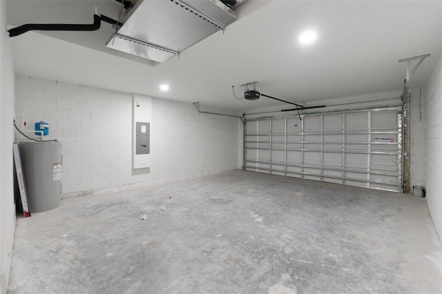 8782 N Sandree Dr, Citrus Springs, FL 34434 - garage featuring electric water heater, a garage door opener, electric panel, and concrete block wall