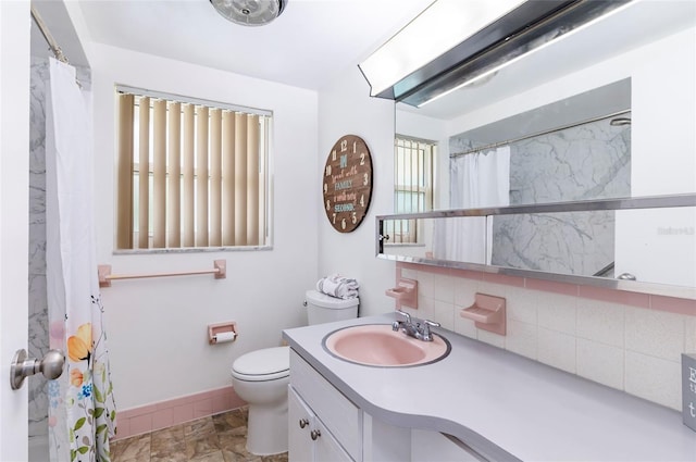 10600 Oleander Dr, Port Richey, FL 34668 - bathroom with backsplash and vanity