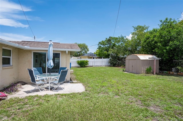 10600 Oleander Dr, Port Richey, FL 34668 - view of yard with a patio area and a storage unit