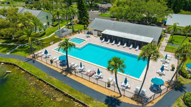 3134 Lake Pine Way Unit F2, Tarpon Springs, FL 34688 - community pool featuring a hot tub