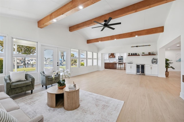 5348 Lawrence Ln, New Port Richey, FL 34652 - living room featuring beverage cooler, light wood-type flooring, ceiling fan, bar area, and recessed lighting