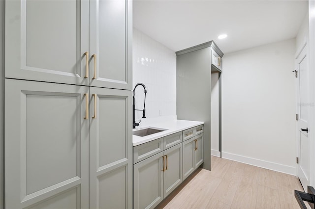 5348 Lawrence Ln, New Port Richey, FL 34652 - laundry room with recessed lighting and light wood finished floors