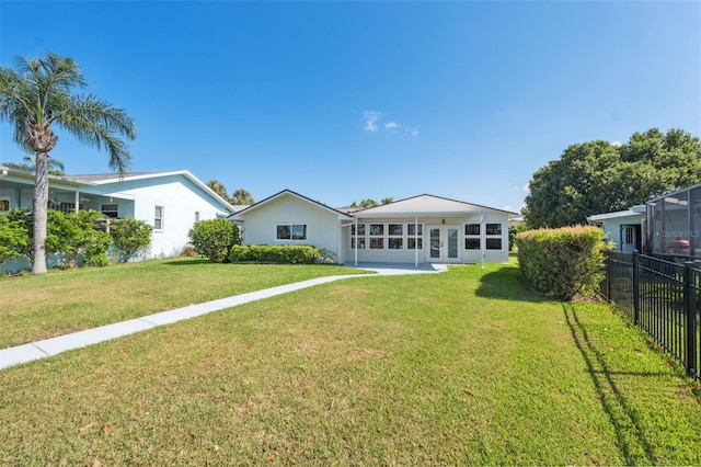 5348 Lawrence Ln, New Port Richey, FL 34652 - rear view of property with french doors