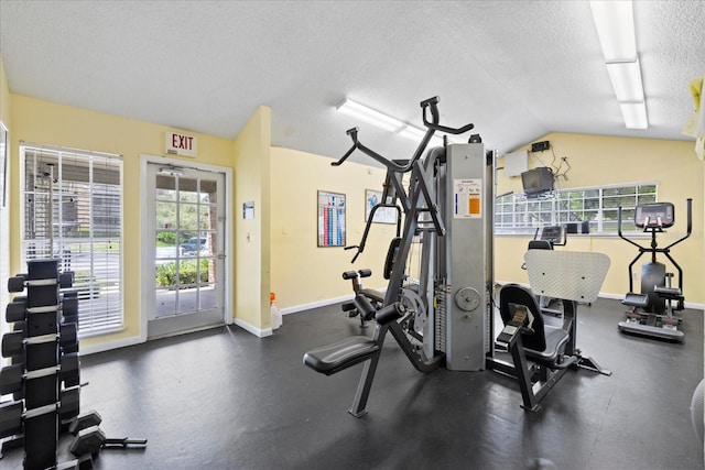 2500 Winding Creek Blvd Unit G106, Clearwater, FL 33761 - workout area with vaulted ceiling and a textured ceiling