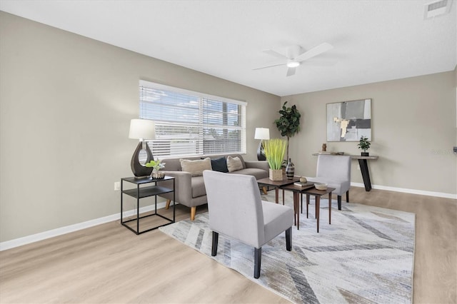 2954 Leisure Ct, Dunedin, FL 34698 - living area featuring wood finished floors and a ceiling fan