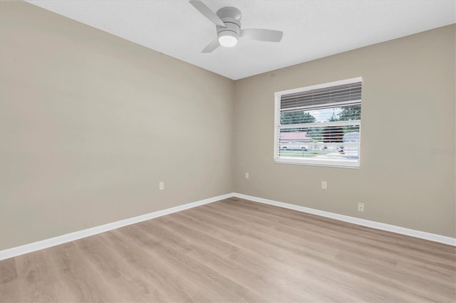 2954 Leisure Ct, Dunedin, FL 34698 - empty room featuring light wood-style flooring and ceiling fan