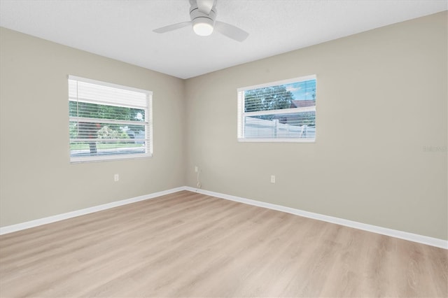 2954 Leisure Ct, Dunedin, FL 34698 - spare room with light wood-type flooring and a ceiling fan