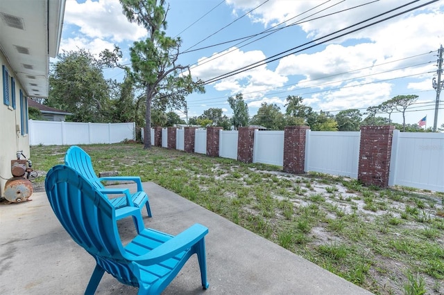 2954 Leisure Ct, Dunedin, FL 34698 - fenced backyard featuring a patio