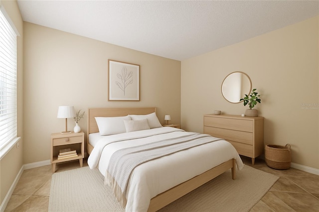 2500 Winding Creek Blvd Unit I106, Clearwater, FL 33761 - bedroom featuring light tile patterned flooring and baseboards