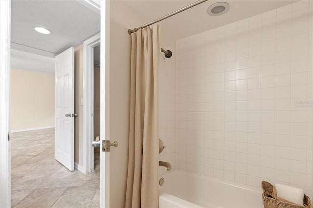 2500 Winding Creek Blvd Unit I106, Clearwater, FL 33761 - bathroom featuring shower / tub combo with curtain, recessed lighting, and tile patterned floors