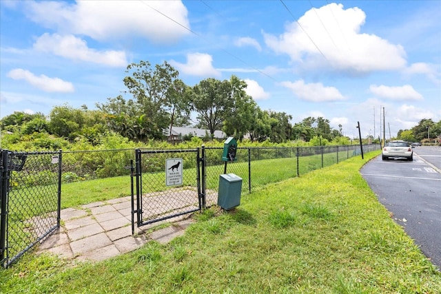 2500 Winding Creek Blvd Unit I106, Clearwater, FL 33761 - view of yard featuring a gate