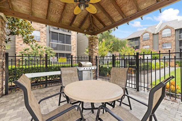 2500 Winding Creek Blvd Unit I106, Clearwater, FL 33761 - view of patio / terrace featuring ceiling fan and outdoor dining space