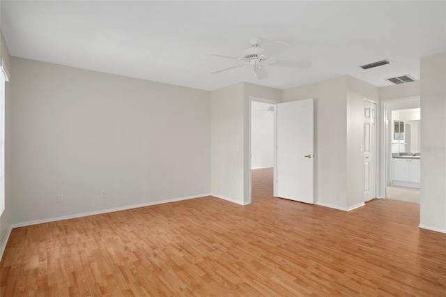 7445 Nature Walk Dr, Spring Hill, FL 34606 - empty room featuring light wood-type flooring and ceiling fan