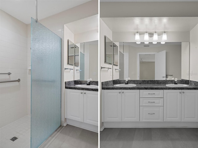 7445 Nature Walk Dr, Spring Hill, FL 34606 - bathroom featuring double vanity and a tile shower