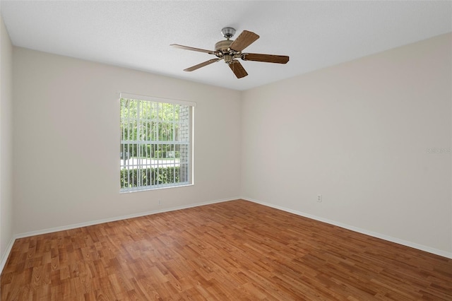 7445 Nature Walk Dr, Spring Hill, FL 34606 - empty room with light wood-style flooring and a ceiling fan