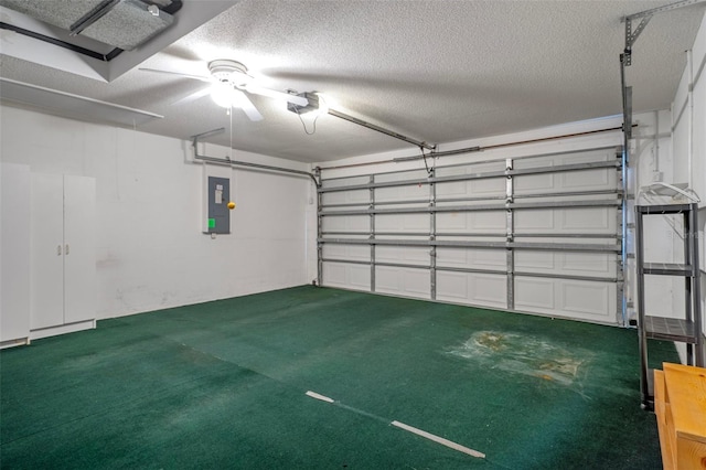 7445 Nature Walk Dr, Spring Hill, FL 34606 - garage featuring electric panel, a garage door opener, and ceiling fan