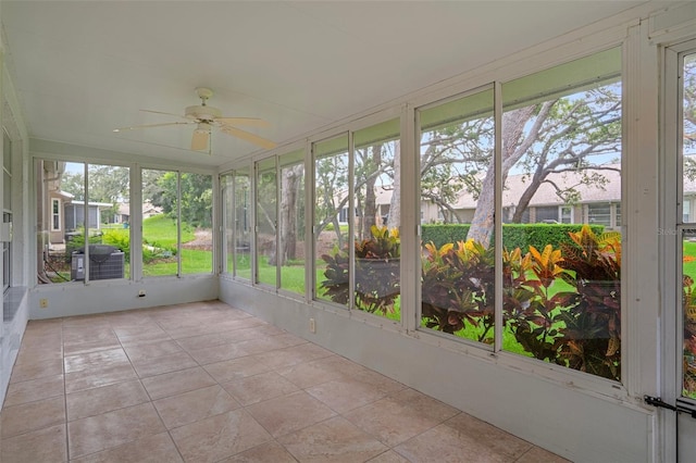 7445 Nature Walk Dr, Spring Hill, FL 34606 - unfurnished sunroom with a ceiling fan and plenty of natural light