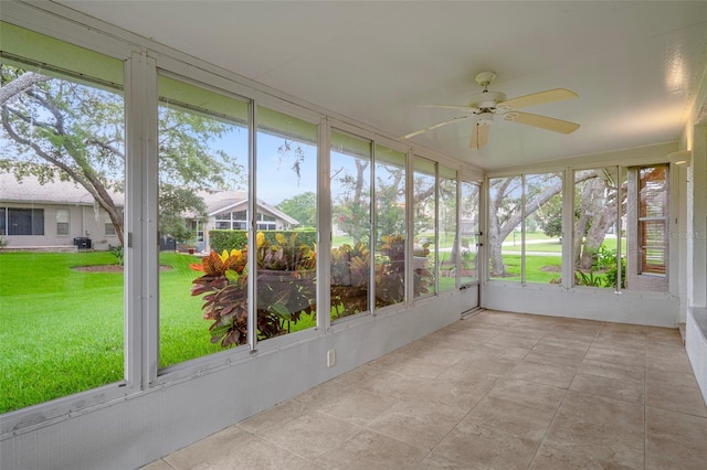 7445 Nature Walk Dr, Spring Hill, FL 34606 - unfurnished sunroom with ceiling fan and healthy amount of natural light