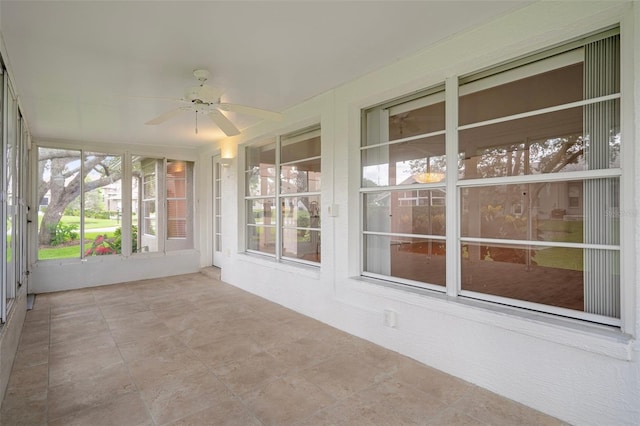 7445 Nature Walk Dr, Spring Hill, FL 34606 - unfurnished sunroom with ceiling fan and plenty of natural light