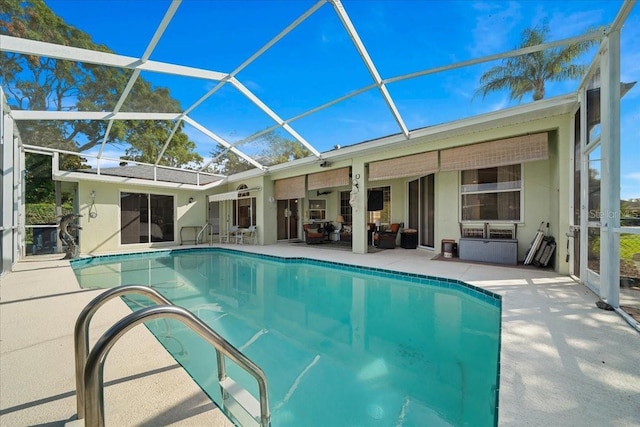 14178 Pullman Dr, Spring Hill, FL 34609 - outdoor pool featuring a patio, outdoor lounge area, and glass enclosure