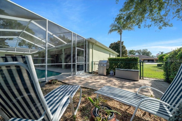 14178 Pullman Dr, Spring Hill, FL 34609 - view of patio / terrace with area for grilling, an outdoor pool, and a gate