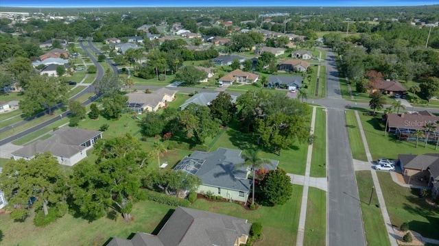 14178 Pullman Dr, Spring Hill, FL 34609 - aerial view of property and surrounding area with nearby suburban area