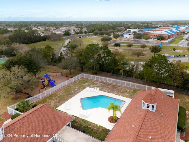 14178 Pullman Dr, Spring Hill, FL 34609 - community pool with a patio
