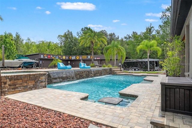26221 Pheasant Run, Wesley Chapel, FL 33544 - outdoor pool with a patio area and view of scattered trees