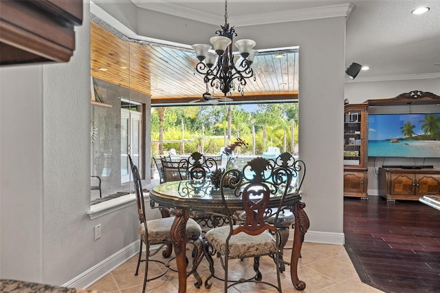 26221 Pheasant Run, Wesley Chapel, FL 33544 - tiled dining space with a chandelier, ornamental molding, and recessed lighting