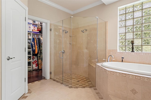 26221 Pheasant Run, Wesley Chapel, FL 33544 - bathroom with a shower stall, a garden tub, a spacious closet, tile patterned floors, and ornamental molding