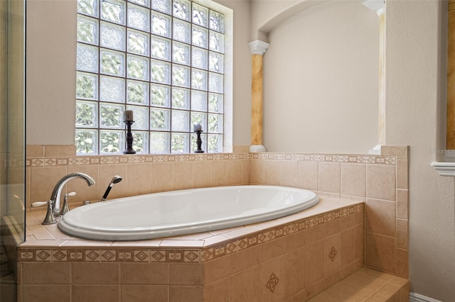26221 Pheasant Run, Wesley Chapel, FL 33544 - full bath featuring a garden tub and a textured wall