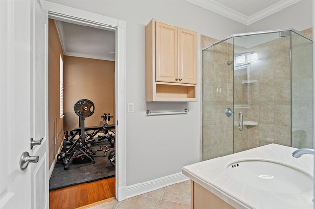 26221 Pheasant Run, Wesley Chapel, FL 33544 - full bathroom featuring ornamental molding, a shower stall, and tile patterned flooring
