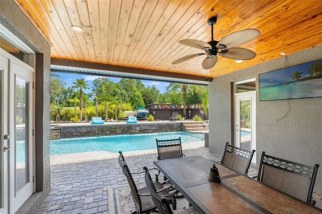 26221 Pheasant Run, Wesley Chapel, FL 33544 - outdoor pool featuring a patio, ceiling fan, and french doors