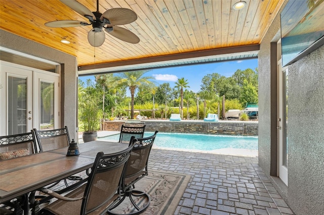 26221 Pheasant Run, Wesley Chapel, FL 33544 - view of patio featuring french doors, an outdoor pool, a ceiling fan, and outdoor dining space
